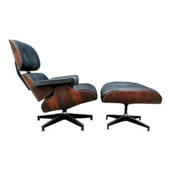 Restored Rosewood Eames lounge Chair with New Herman Miller Leather Cushions