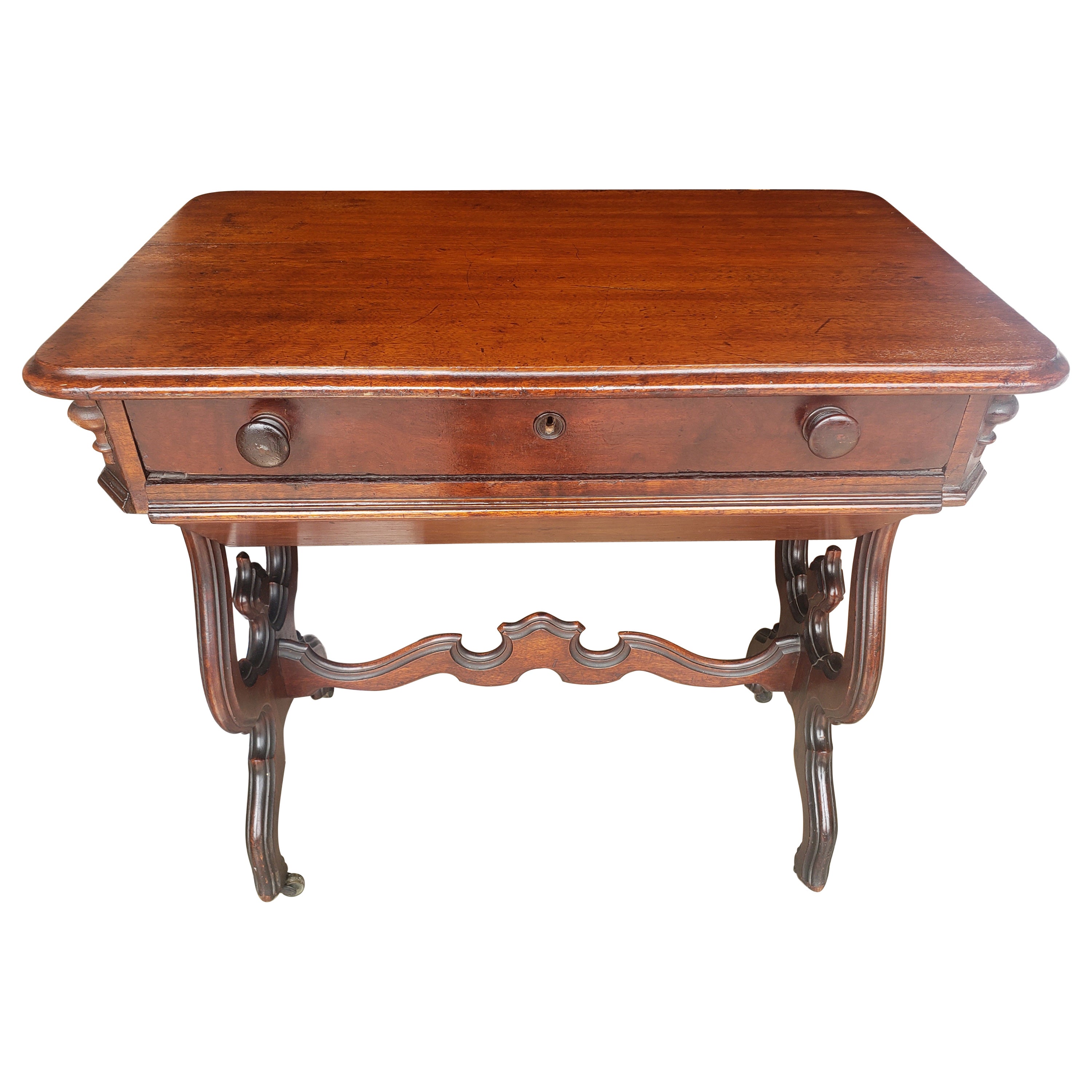 19th Century Victorian Rococo Style Carved Mahogany Rolling Sewing Table For Sale