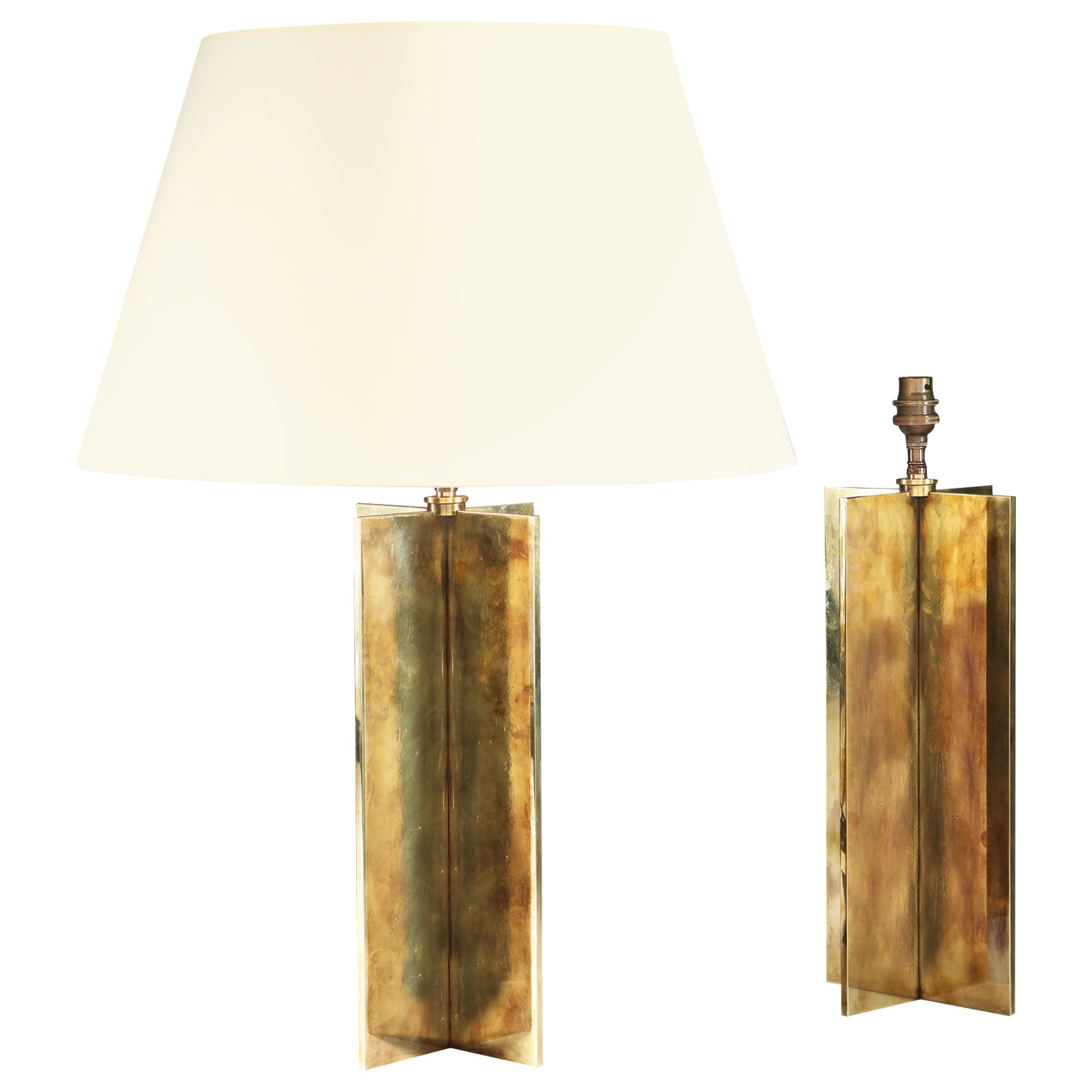 A Pair of Brass Patinated X Form Lamps For Sale