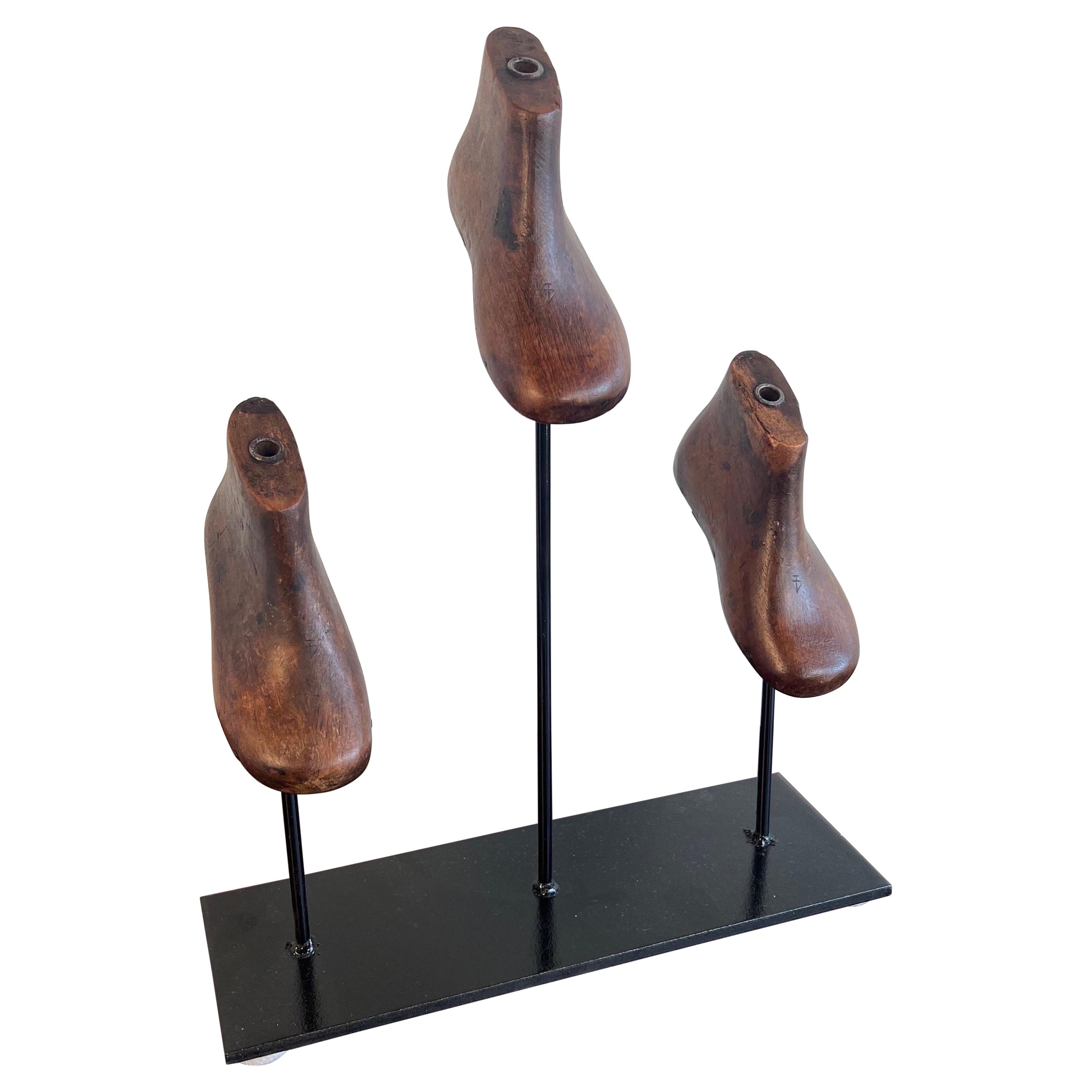 Set of Vintage Shoe Forms Mounted on Iron Base For Sale