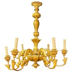 Charmant  Lustre néo-baroque en bois doré circa 1950