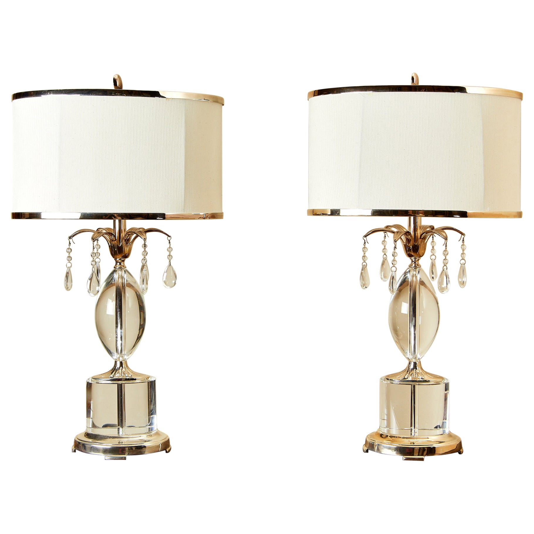 John Richard, pair of lamps with altuglass and silvered brass pendants.