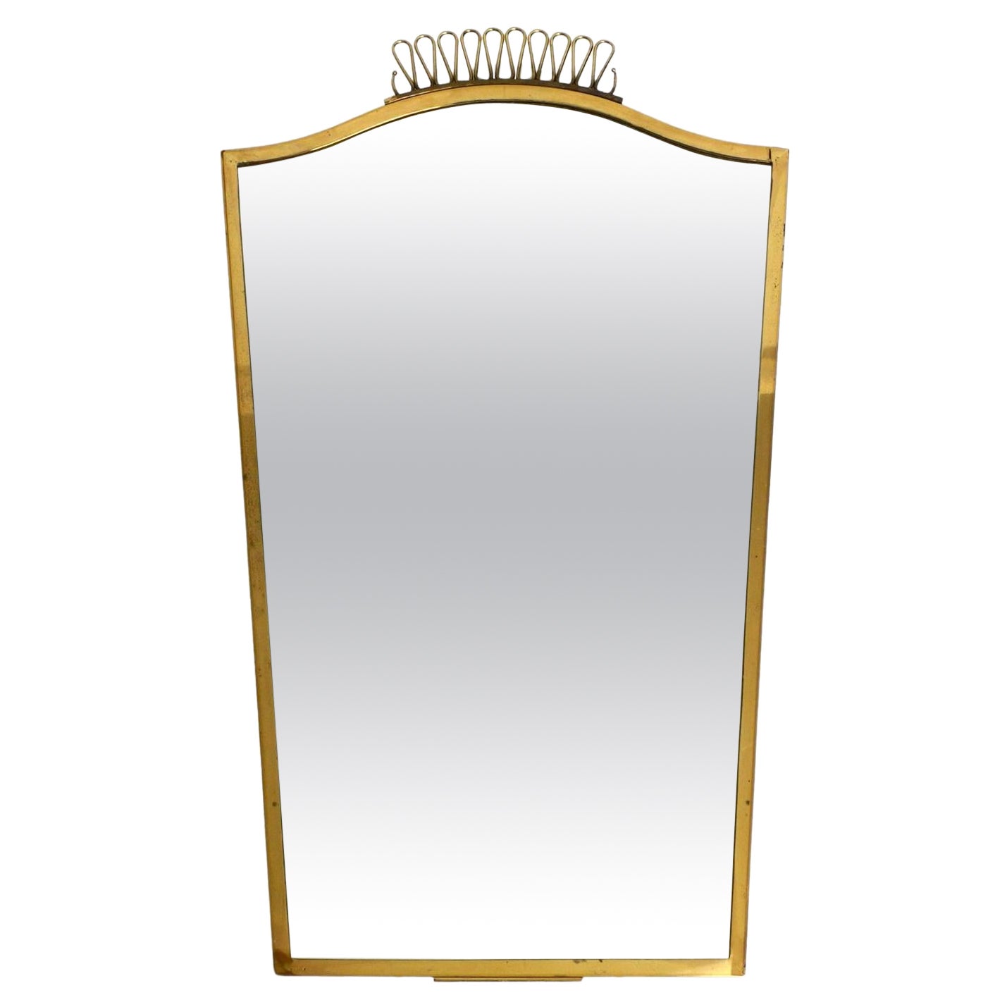 Extraordinary, elegant, large, heavy, Mid Century brass wall mirror For Sale