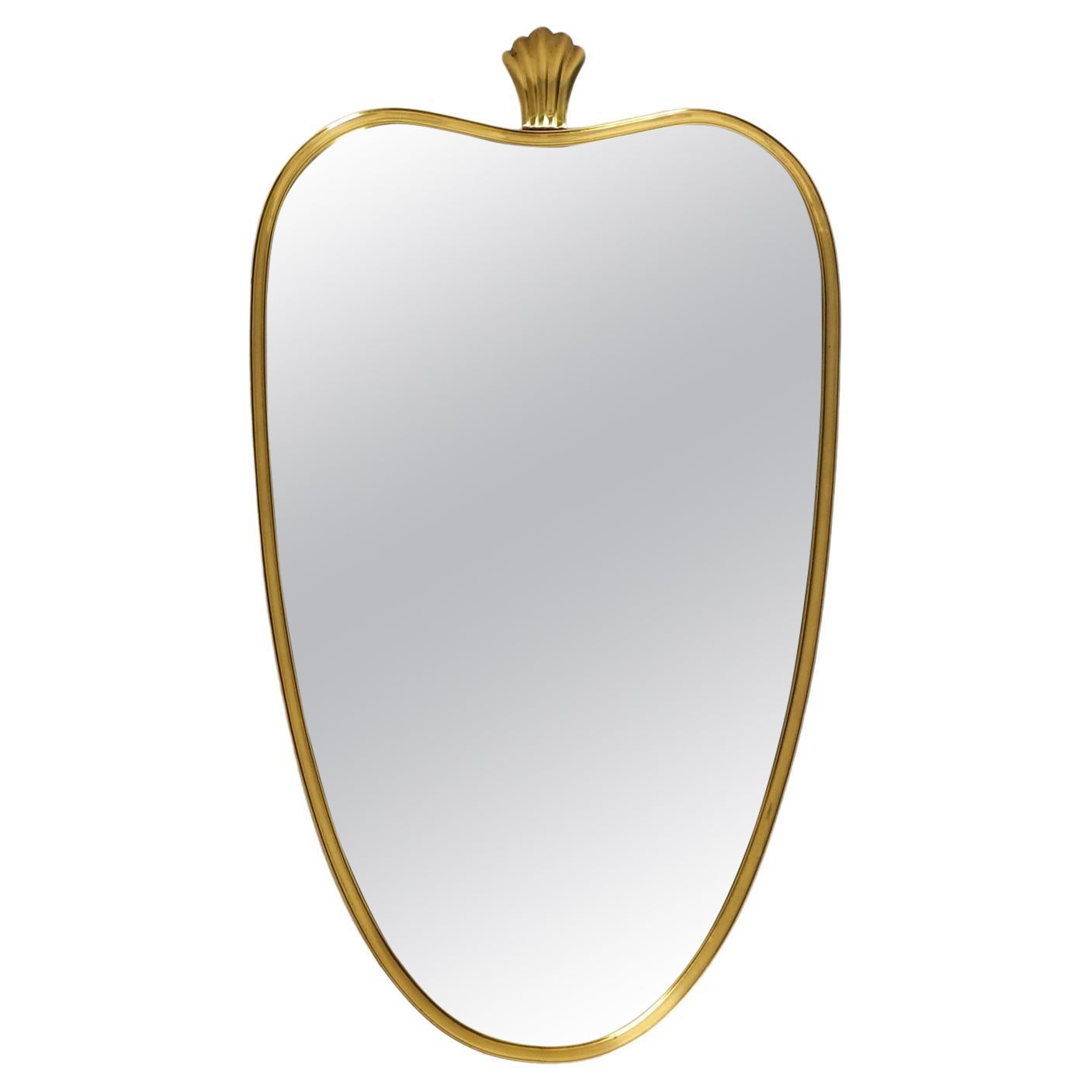 Beautiful small, heavy Mid Century brass wall mirror by Münchner