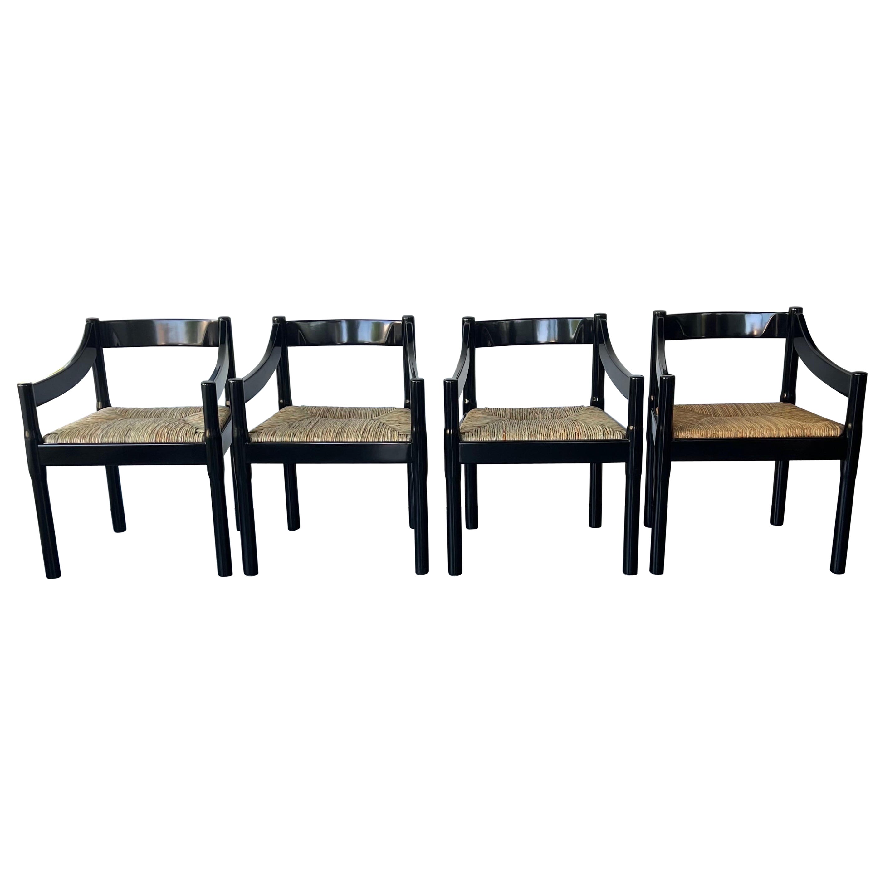 Set of x2 Glossy Black Carimate Carver Chairs By Vico Magistretti  For Sale