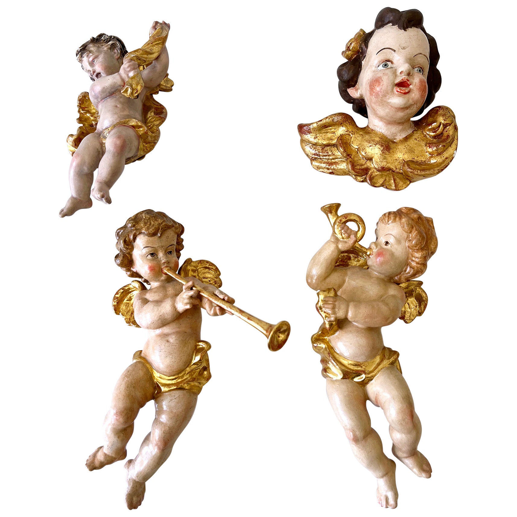 Ensemble de quatre magnifiques putti/angelots en bois polychrome sculpté à la main, Allemagne, années 1960 en vente