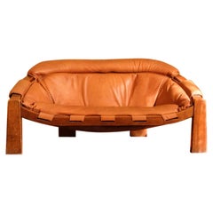 Italian sofa in camel leather by the designer Luciano Frigerio, 1970s