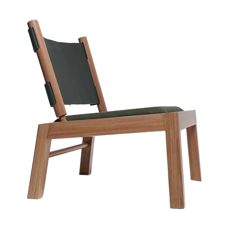 Oulipo is a contemporary lounge chair handcrafted in certified brazilian hardwood 