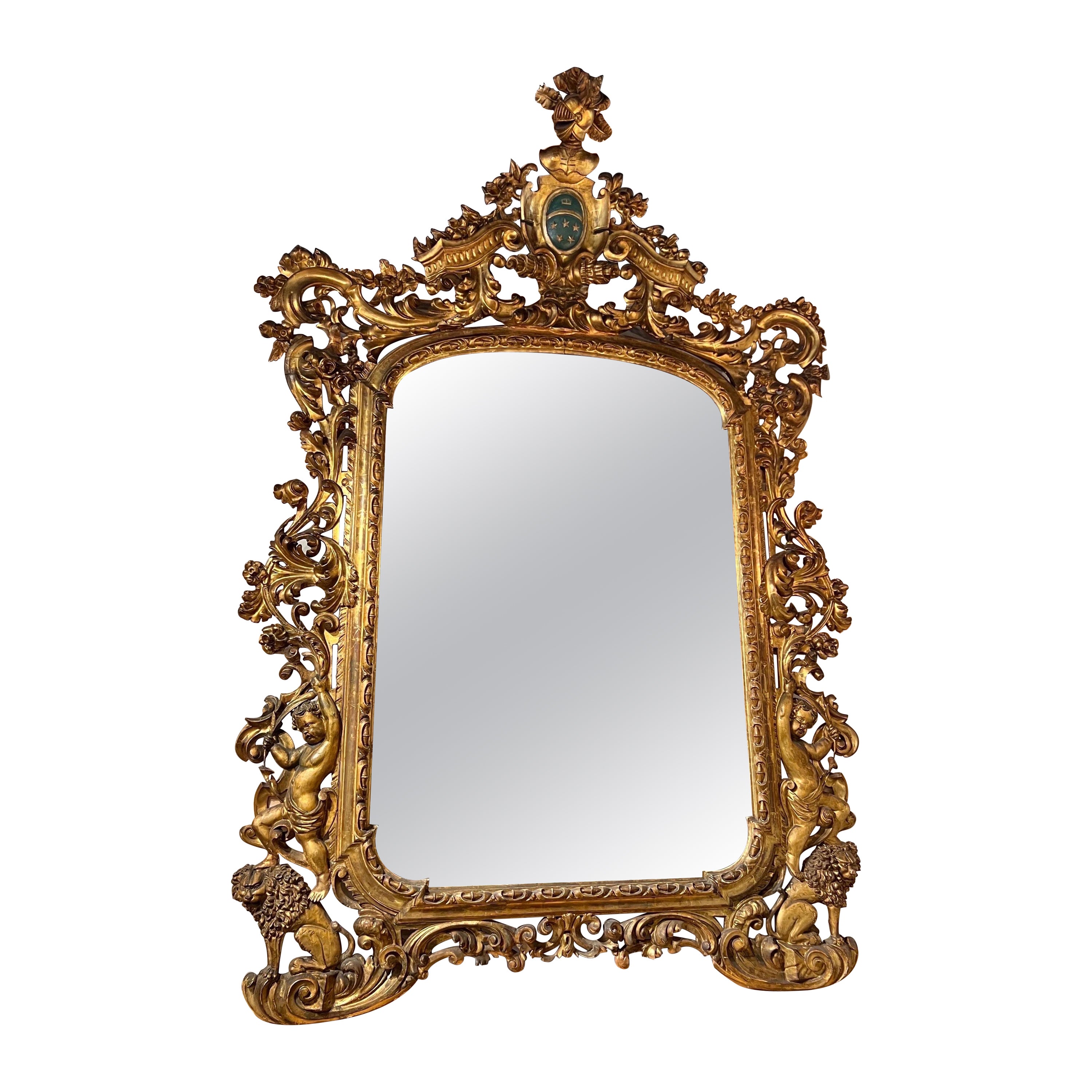 Monumental 18th-19th century Giltwood mirror with coat of arms  For Sale