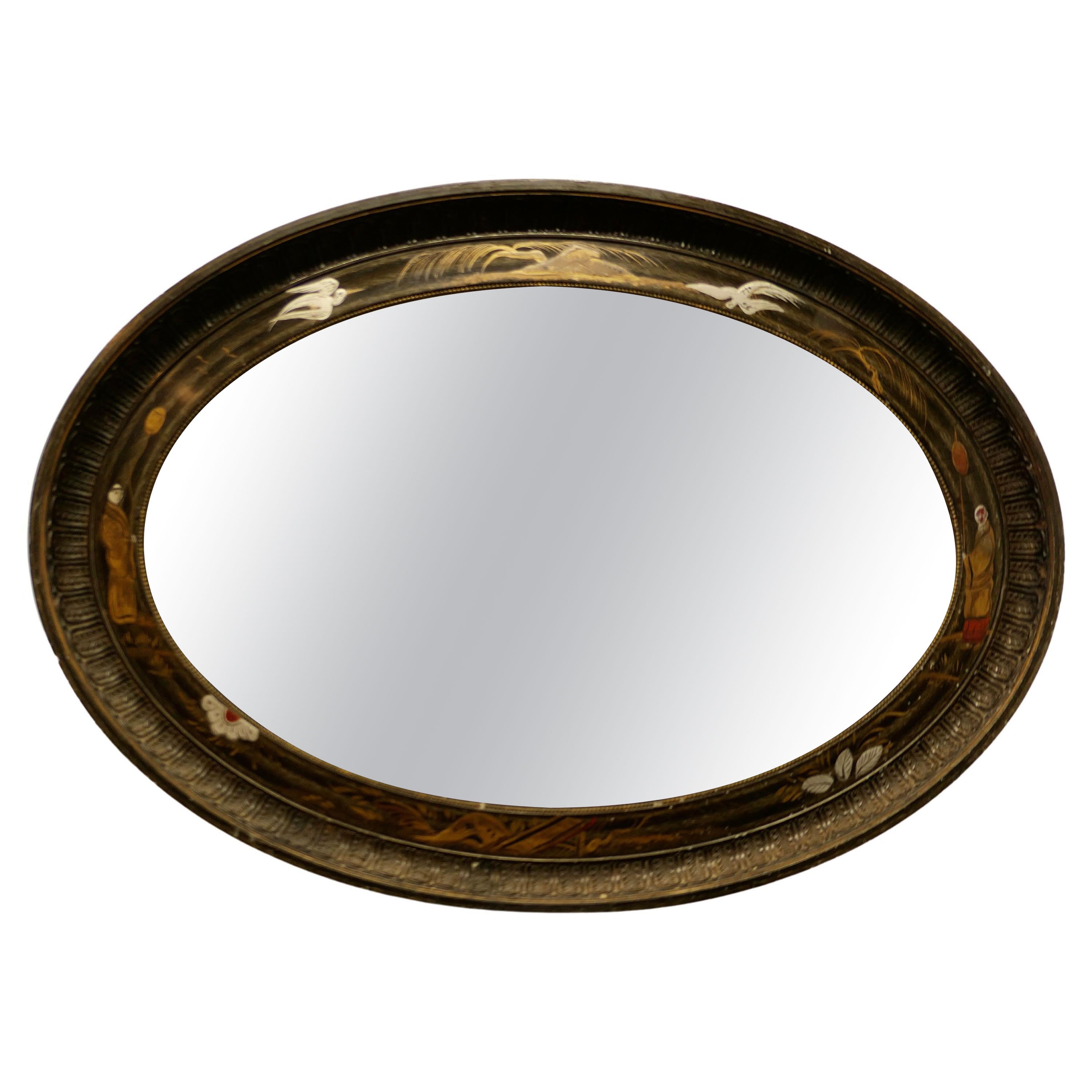 Black Lacquer Carved Chinoiserie Oval Wall Mirror     For Sale