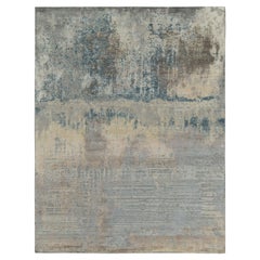 Alfombra abstracta Rug & Kilim de color gris plateado y estampado azul por todas partes