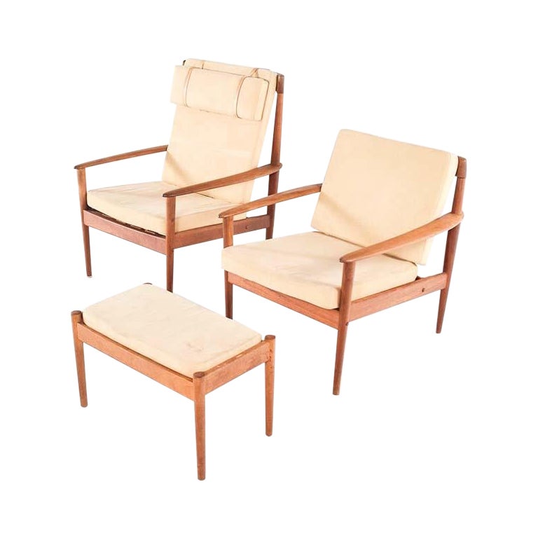 Paire de fauteuils en teck de Grete Jalk par Poul Jeppesen en 1956 en vente