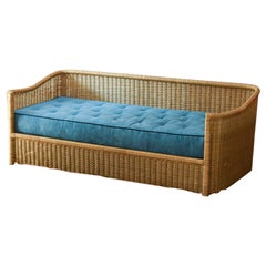 Wicker sofa complete with cushion