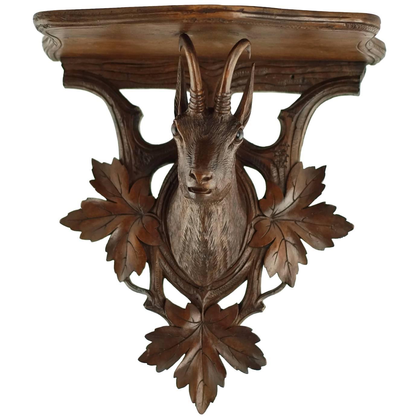 19th Century Black Forest Carved Chamois Head Wall Shelf with Foliate Detail