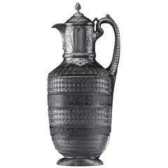 Silver-mounted antique cut glass wine jug