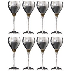 Set of 8 mid-century silver & gilt wine goblets