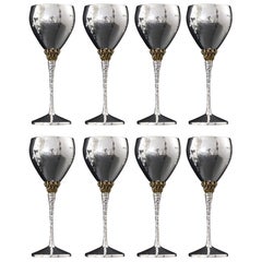 Set of 8 mid-century silver & gilt wine goblets