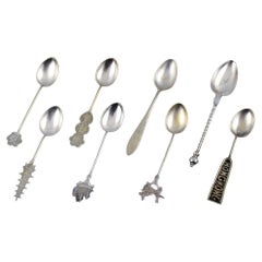 Vintage Hong Kong silver, eight spoons with different motifs. 1930/40s.