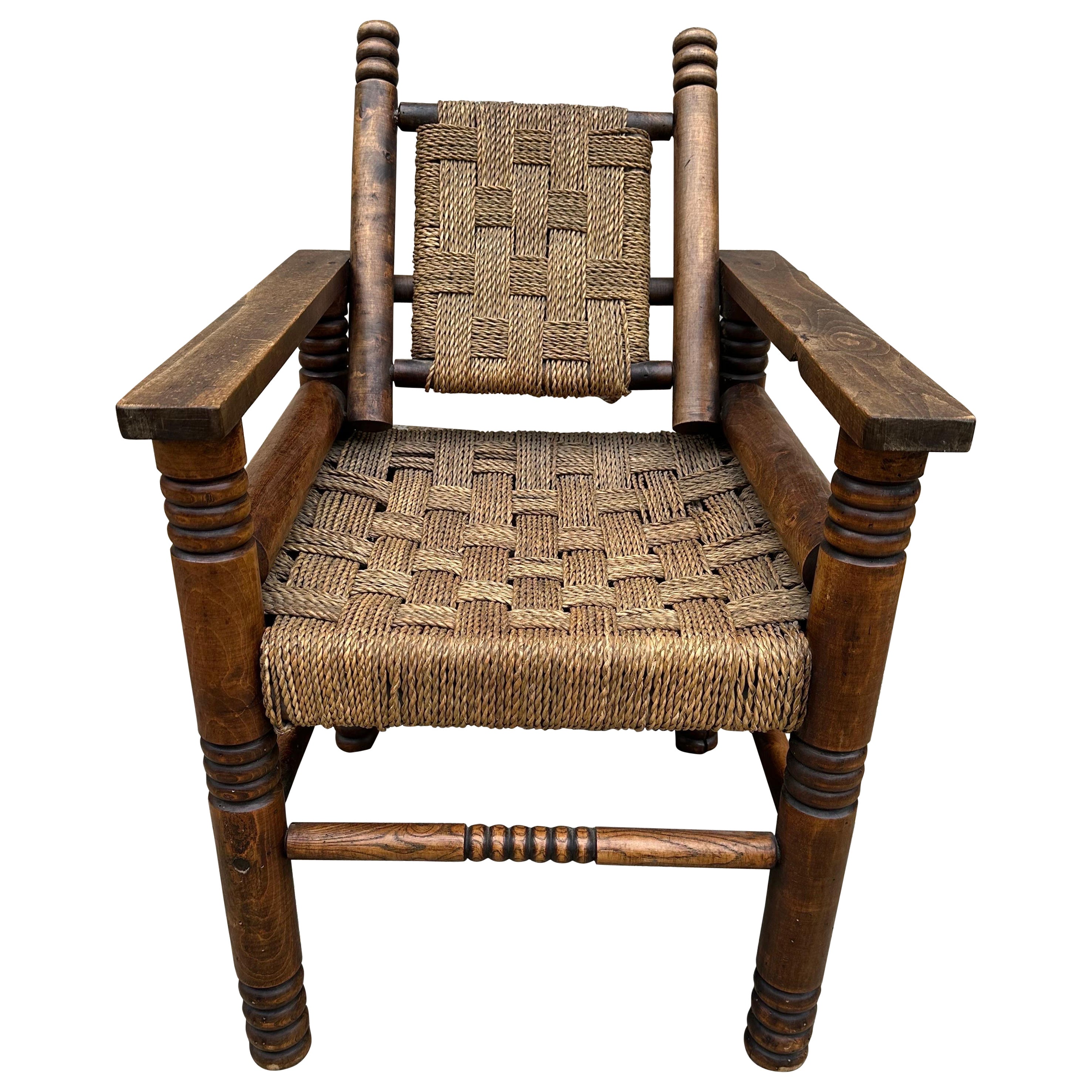 French Oak and Cord Lounge Chair by Charles Dudouyt For Sale