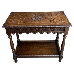 Ancienne table de salon anglaise en chêne sculpté de style Arts and Crafts