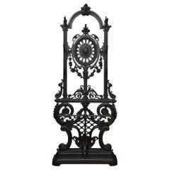 Antique Coalbrookdale style cast iron hall stand