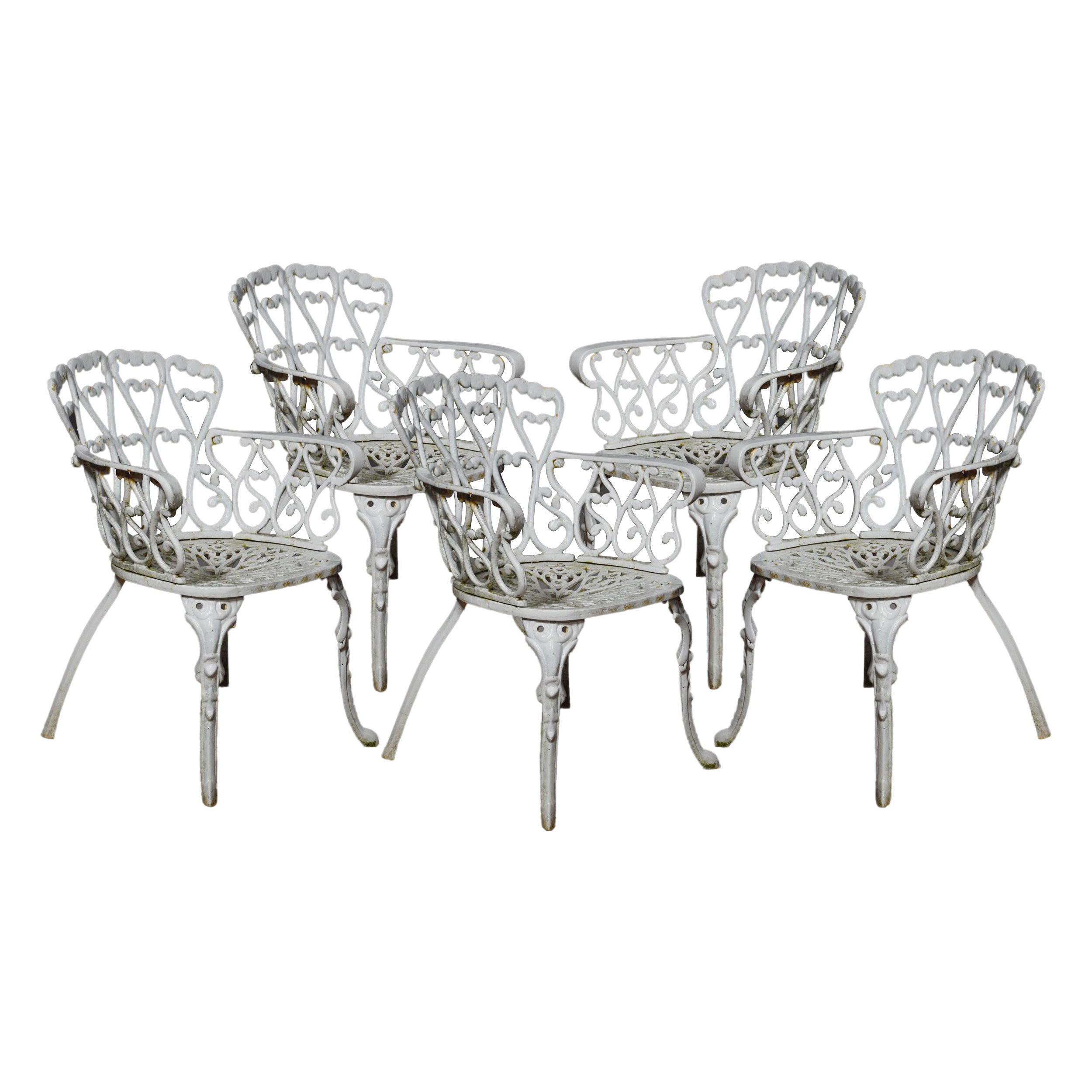 Ensemble de cinq chaises de jardin en fonte de style Coalbrookdale en vente