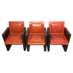 Pair of orangeish and brown leather armchairs (Can be sold individually). French