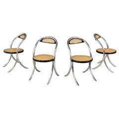 Used Italian mid-century modern Chairs in straw, black wood and tubular steel, 1970s