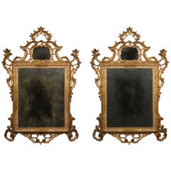 Pair of Venetian Rococo Carved Giltwood Mirrors