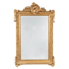 Miroir en bois doré de style Louis XV