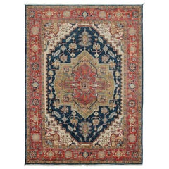Rug & Kilim’s Serapi style rug in Blue with Beige and Red Rosette Medallion 