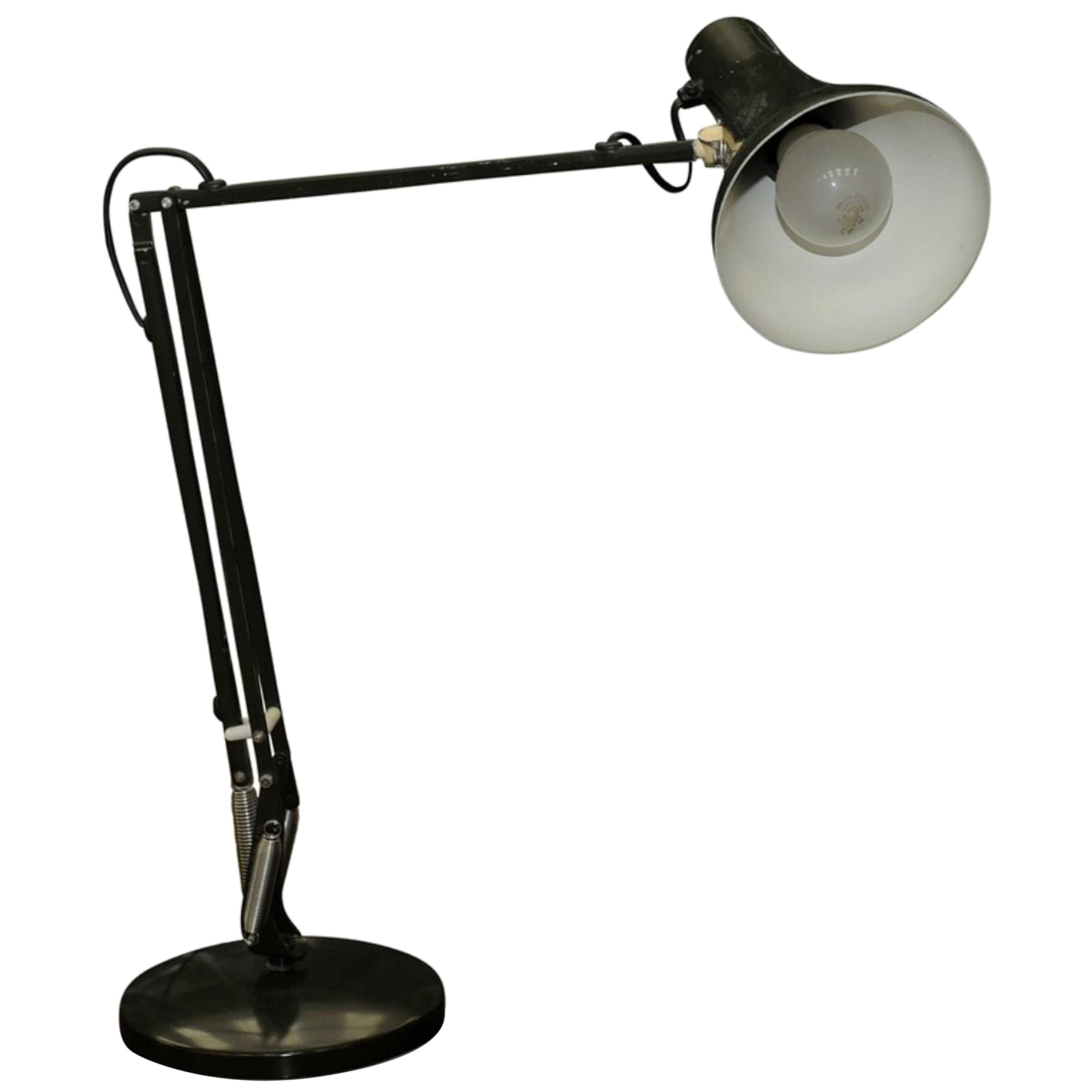 Anglepoise by Herbert Terry Apex 90 Articulated Desk Lamp in Racing Green 1970s

1931: Automotive engineer, George Carwardine developed a theoretical concept for balancing weights using springs, cranks and levers. Using special springs with a