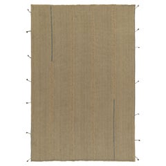 Rug & Kilim’s Contemporary Kilim in Sandy Solid Beige-Brown with Blue Accents