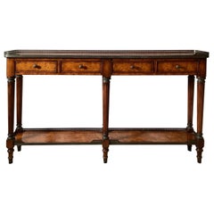 A Burled Walnut Gallery Edge Console Table by Theodore Alexander. 