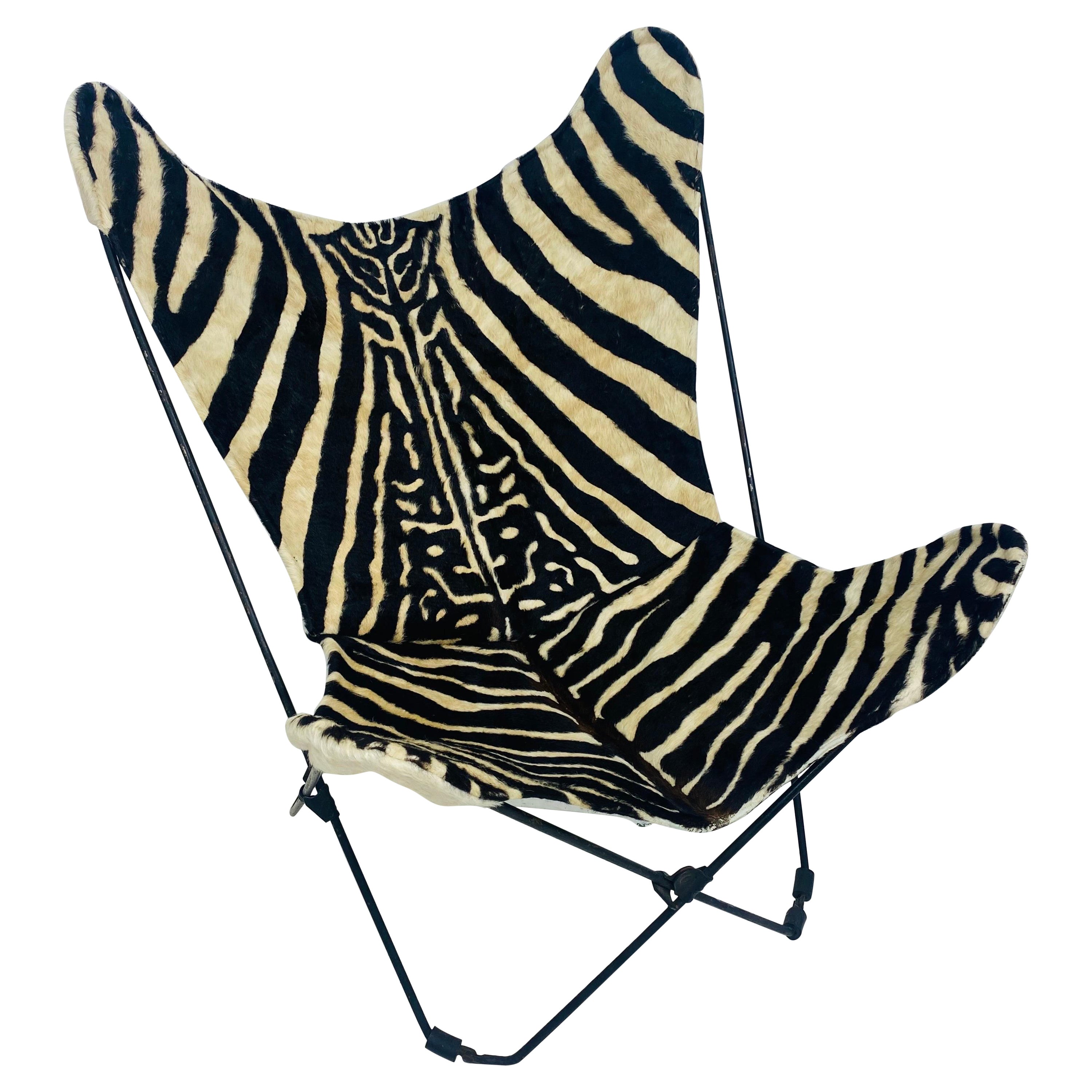 Mid century, modern printed cowhide folding safari chair For Sale