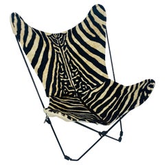 Retro Mid century, modern printed cowhide folding safari chair