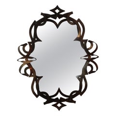Vieux miroir à ruban en métal patiné
