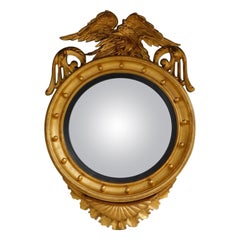 Miroir convexe en bois doré américain avec aigle perché en fleur, vers 1820