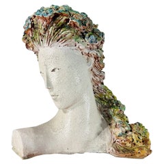 Terracota polychromed bust of woman with flowers signed 