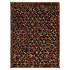 Tapis tribal vintage Baluch à motifs géométriques multicolores par Rug & Kilim