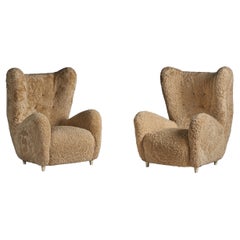 Emilio Sarrachi, Sizeable Lounge Chairs, Shearling, Wood, Italy, 1940s