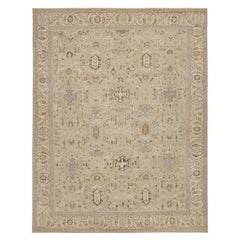 Rug & Kilim's Oushak Style Rug in Blue and Beige-Brown Floral Patterns (tapis de style Oushak aux motifs floraux bleu et beige-brun)