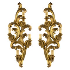 Pair of Ancient Gilded Wood Appliques, Italy, late 19th Century.