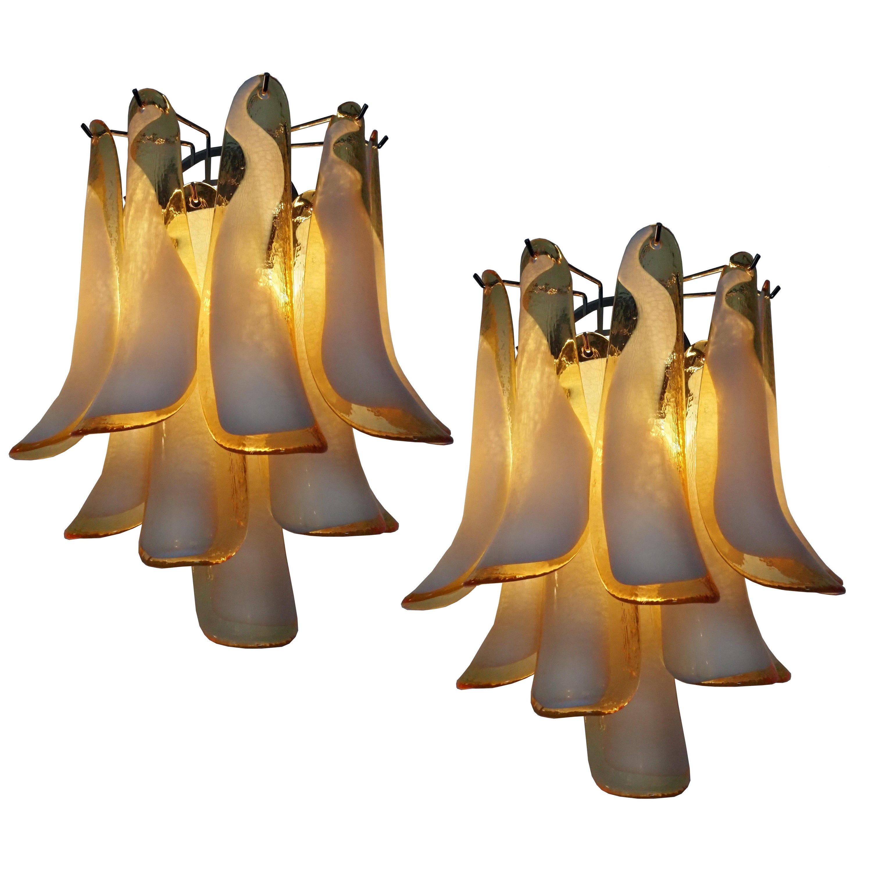 Pair of Vintage Italian Murano wall lights in the manner of Mazzega – caramel lattimo glass petals
Pair of Vintage Italian Murano appliques in the manner of Mazzega. Wall lights have 10 caramel lattimo glass petals (for each applique) in a chrome