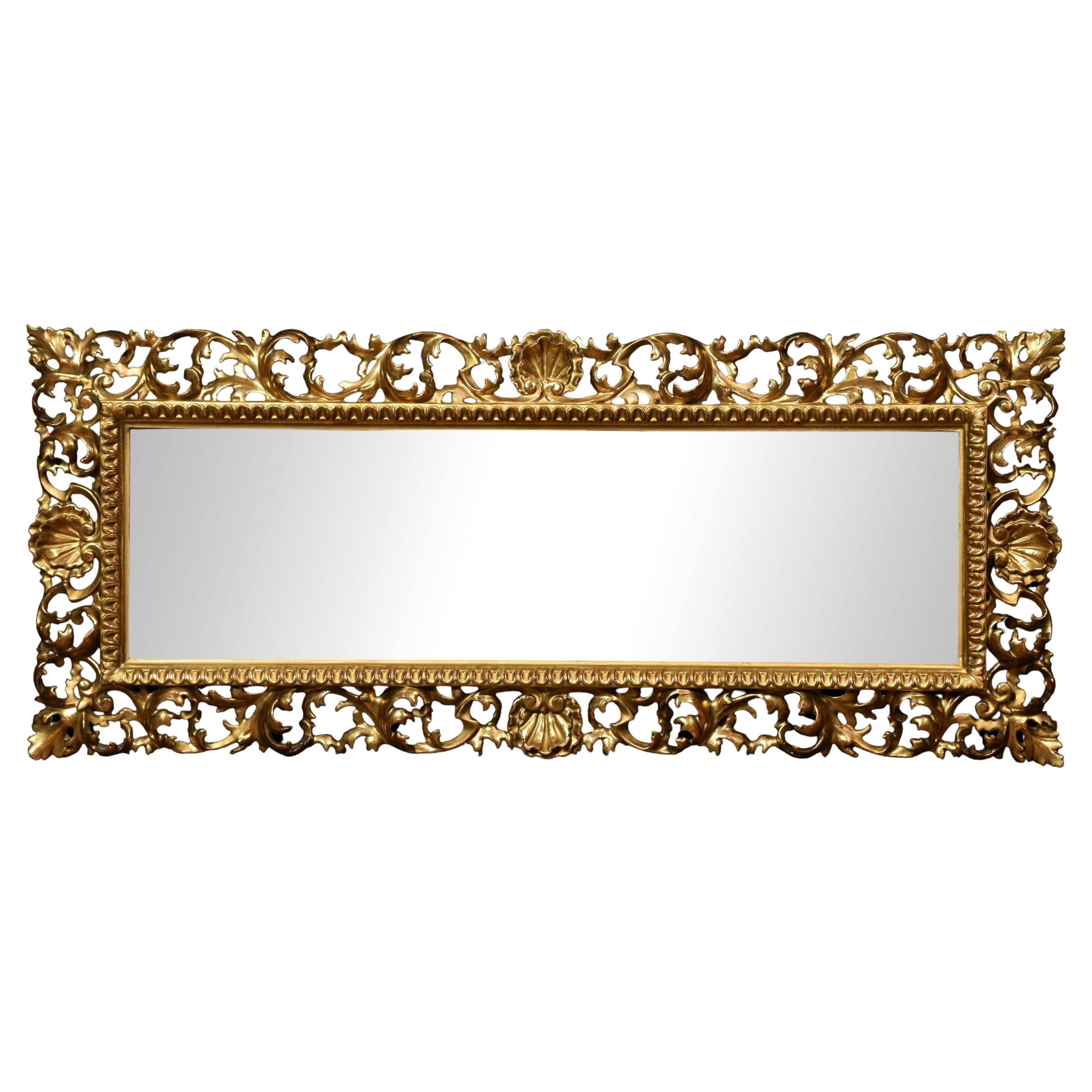 Florentine giltwood wall mirror For Sale