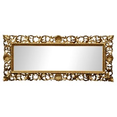 Antique Florentine giltwood wall mirror