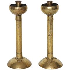 Pair of Arts and Crafts Hammered Brass Candlesticks