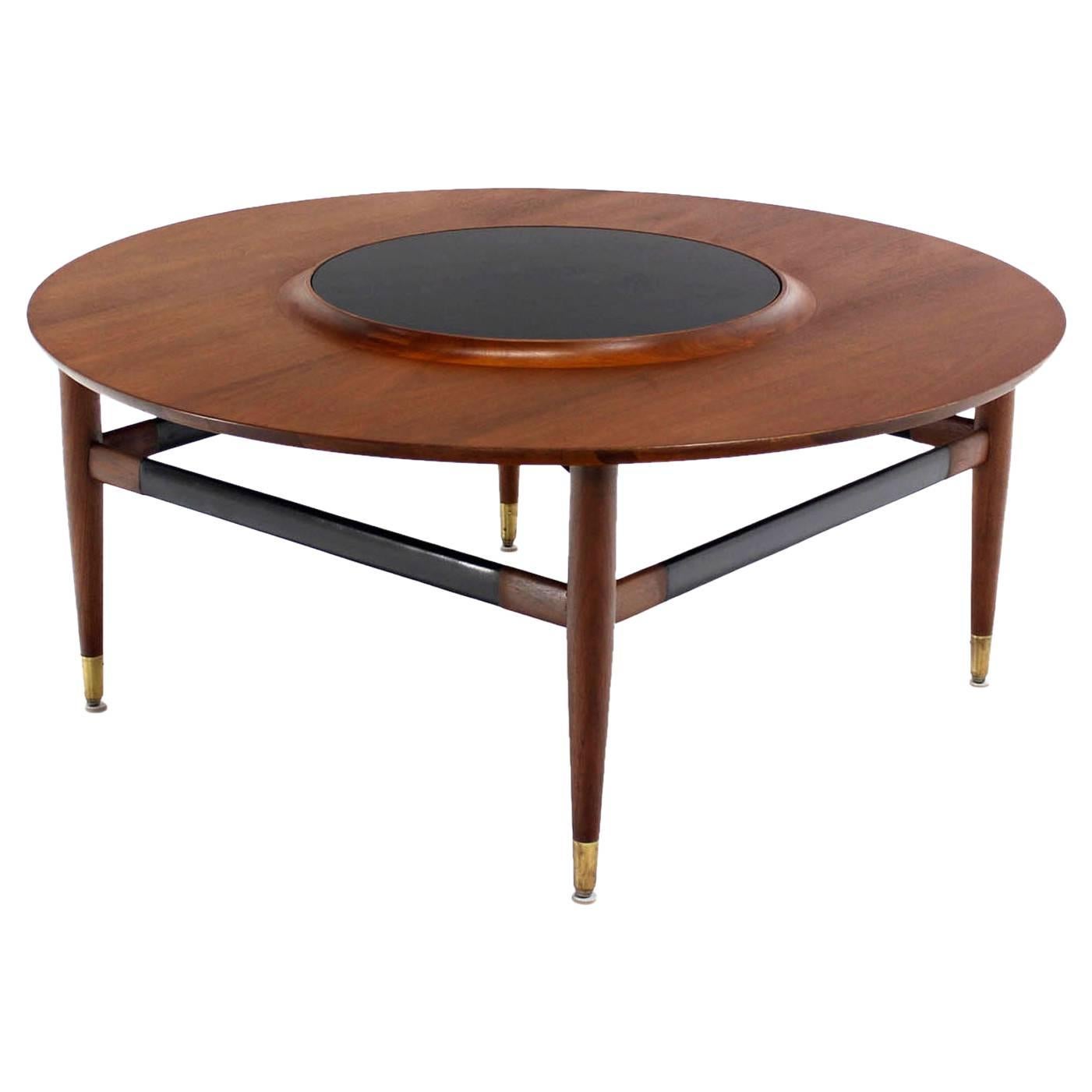 Round Walnut Coffee Table with Raised Black Laminate Lazy Susan Center  For Sale