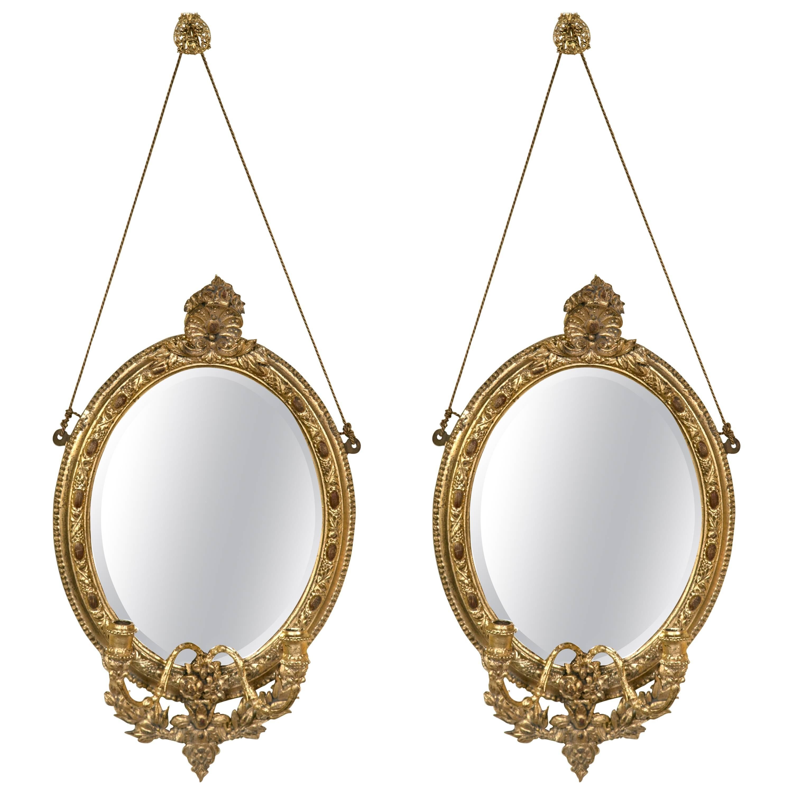 Miroirs avec bougeoirs de style Louis XVI, or doré, bois sculpté, Europe, années 1920 en vente