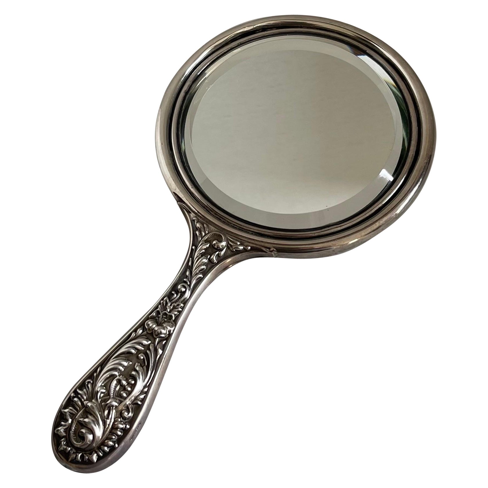Antique Sterling Silver Repoussè Hand Mirror For Sale